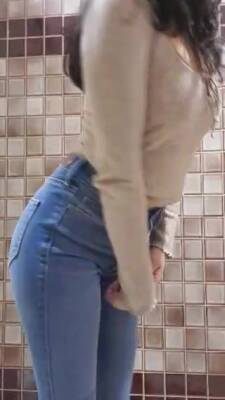 Showing Off Her Ass In Tight Denim Jeans on freereelz.com