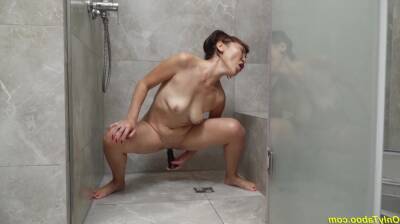 Crazy asian grandma toying at the shower on freereelz.com