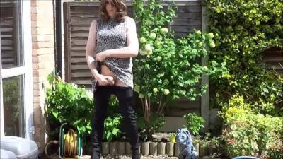 Sexy masturbating crossdresser in thigh boots outdoors on freereelz.com