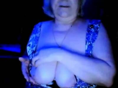 Hot granny flashing her big tits of her husband hidden - Russia on freereelz.com