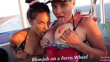 Must See! Risky Public Double Blowjob on a Ferris Wheel with Teen & MILF on freereelz.com