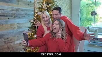 Cute Adopted Daughter Joins Her Foster Parents For Christmas Fuck on freereelz.com