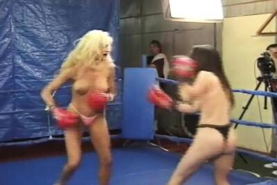 Topless female boxing as blonde battles brunette with body on freereelz.com