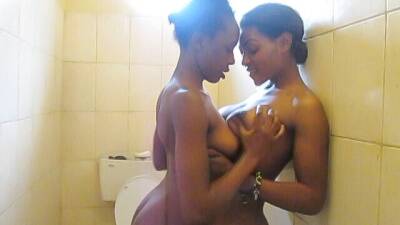 African Cuties Eating Pussy and Fingering in Shower on freereelz.com