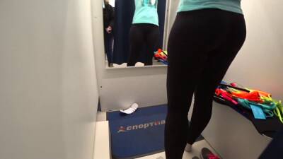 Mature milf and her young daughter in a public fitting room. Different swimsuits and mini bikinis on sexy big ass. - Russia on freereelz.com