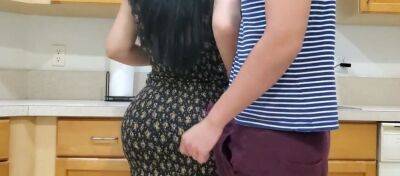 Voluptuous mommy is banged by her randy stepson in the kitchen while making dinner on freereelz.com