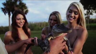 Naked badass babes visiting a gator farm on freereelz.com