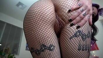 Tatted Slut Shows Off Tight Asshole In Fishnets on freereelz.com