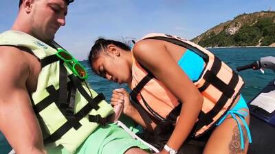 Thai teen giving blowjob on a jet ski - Thailand on freereelz.com