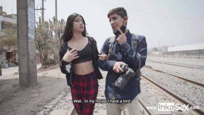 Petite Venezuelan model is approached by Peruvian near train line - Peru on freereelz.com