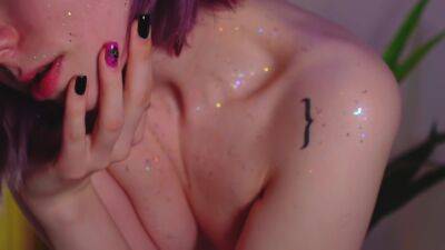 Purple Hair Teen Puts Glitter On Naked Body on freereelz.com