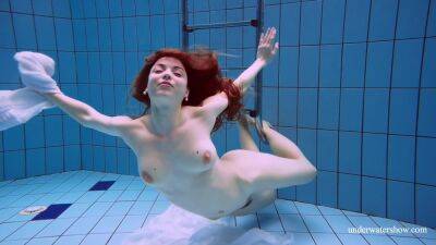 Redhead Marketa In A White Dress In The Pool - Russia on freereelz.com