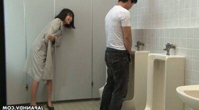 Crazy Asian chick Uta Kohaku pisses on dick of one stranger dude in a public toilet on freereelz.com