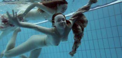 Euro And Russian Two Dressed Beauties Underwater Anna Netrebko And Lada Poleshuk - Russia on freereelz.com