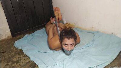 Hysterical Bondage Prisoner Hogtied Naked And Squirming In The Basement! on freereelz.com