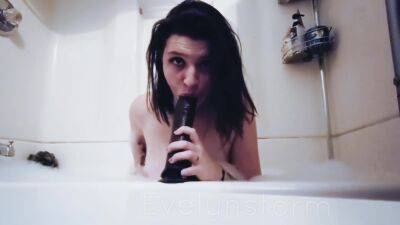 Sucking And Gagging On A Big Dildo In The Bathtub on freereelz.com