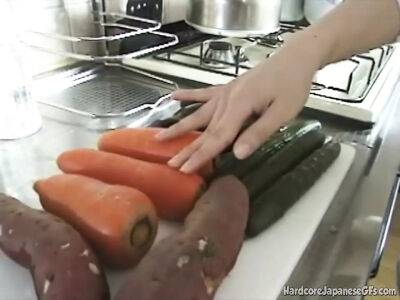 Japanese Babe insert Carrot on her hairy pussy masturbating - Japan on freereelz.com