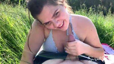 Outdoor Blowjob in the meadow while people walk by in public - cum in her mouth - Sarah Sota on freereelz.com