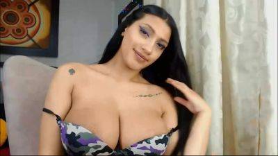 Busty Latina Babe Teaes In Front Of Webcam on freereelz.com