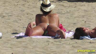 Amazing Ass Sexy Bikini Hot milf Backview at the beach on freereelz.com