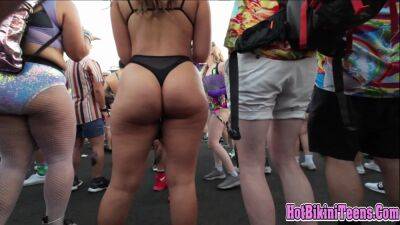 Phat ass Latina raver girl shaking her big ass cheeks at rave festival on freereelz.com