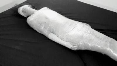 Mummified in plastic wrap girl gets fucked and squirts after fingering on freereelz.com