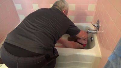 Lovely Ashley Is Hogtied And Humiliated In Bathtub on freereelz.com