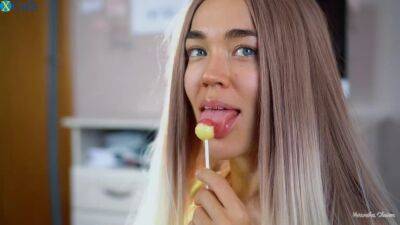 Teen babe can't decide what she likes more - a cumshot or a lollipop on freereelz.com