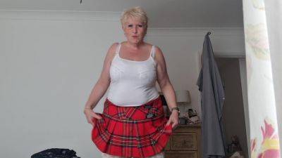 Tartan Skirt Stockings And White See Thru Panties on freereelz.com