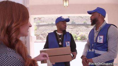 Delivery guys ram this fine redhead for mind-blowing XXX threesome on freereelz.com