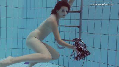 Sensational Sima Lastova In Poolside Swim Session on freereelz.com