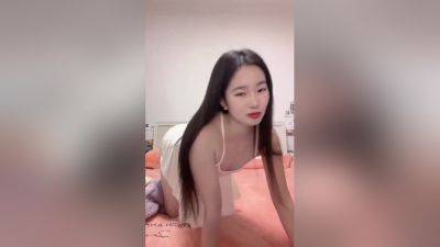 Cute asian teen girl playing alone - China on freereelz.com