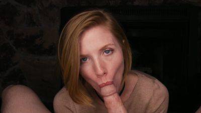 Freckled redhead throats the big dick and lets it explode on her face on freereelz.com