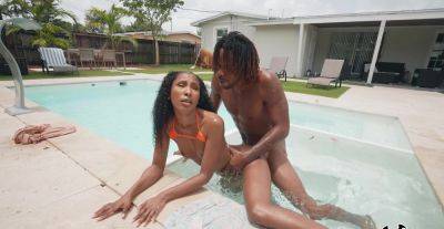 Aroused ebony goes very loud during outdoor pool porno with her new BF on freereelz.com