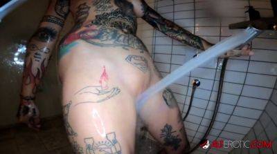 Lucy ZZZ gets her inked body pounded hard in the shower on freereelz.com