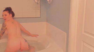 Stunning Ginger Slams Her Buttocks In The Bath on freereelz.com