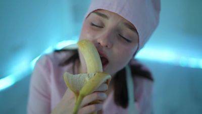 Young nurse and her banana on freereelz.com