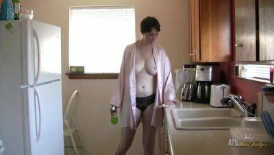 Mature Inara Byrne Nude: Sensual Kitchen Cleaning Reveals All on freereelz.com