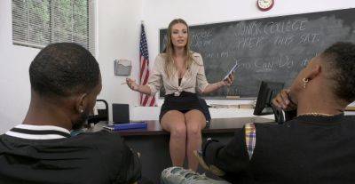 Appealing MILF teacher gets busy with two black studs on freereelz.com