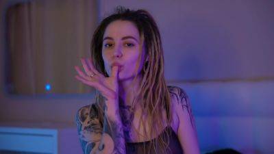 Babe With Dreadlocks And Tattoos Plays With Pussy While Is Home on freereelz.com