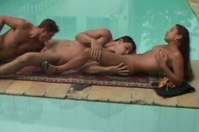 Bisexual Threesome In Swimming Pool on freereelz.com