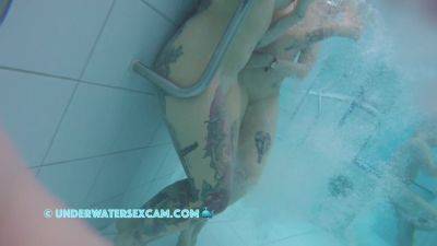 In This Underwater Video We See A Lot Of Piercings And Tattoos on freereelz.com