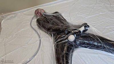 Dollified #2 - A Vacuum-sealed Latex Doll Getting Herself Off With A Magic Wand on freereelz.com