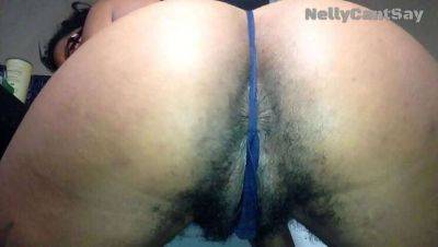 Witness Nelly's Hairy Ebony Pussy Through Her G-String on freereelz.com